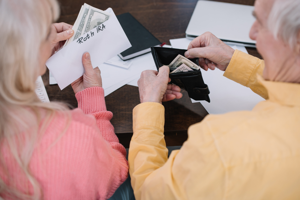 Roth IRA written on an envelope.