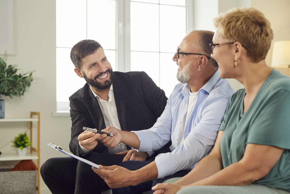 Financial advisor reviewing Roth conversion timing with a senior couple - McLane Advisors, Montgomery & Tomball, TX